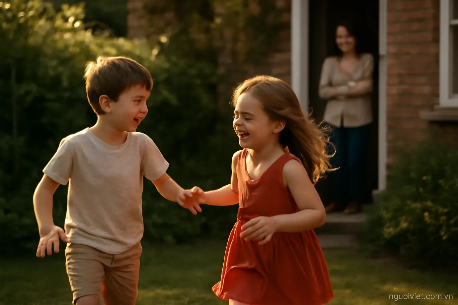 two children playing in a garden while an adult watches from a doorway in late sunlight